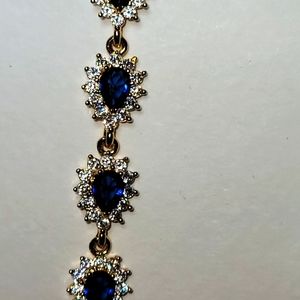 Blue And White Simulated Diamond Bracelet  In Goldtone 7.5 Inches   7.75 Ctw